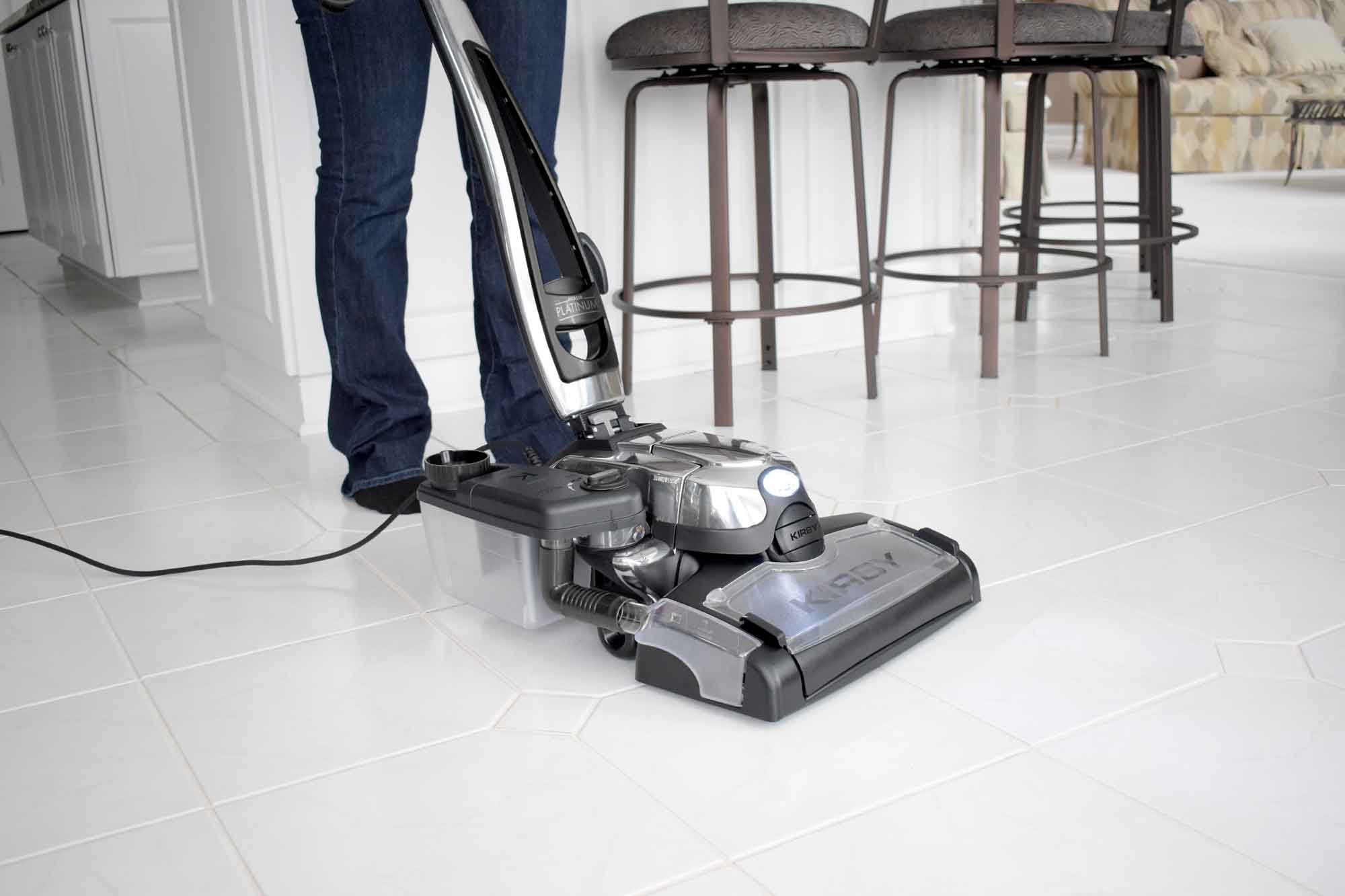A Kirby vacuum with it's multi-surface shampoo system attached