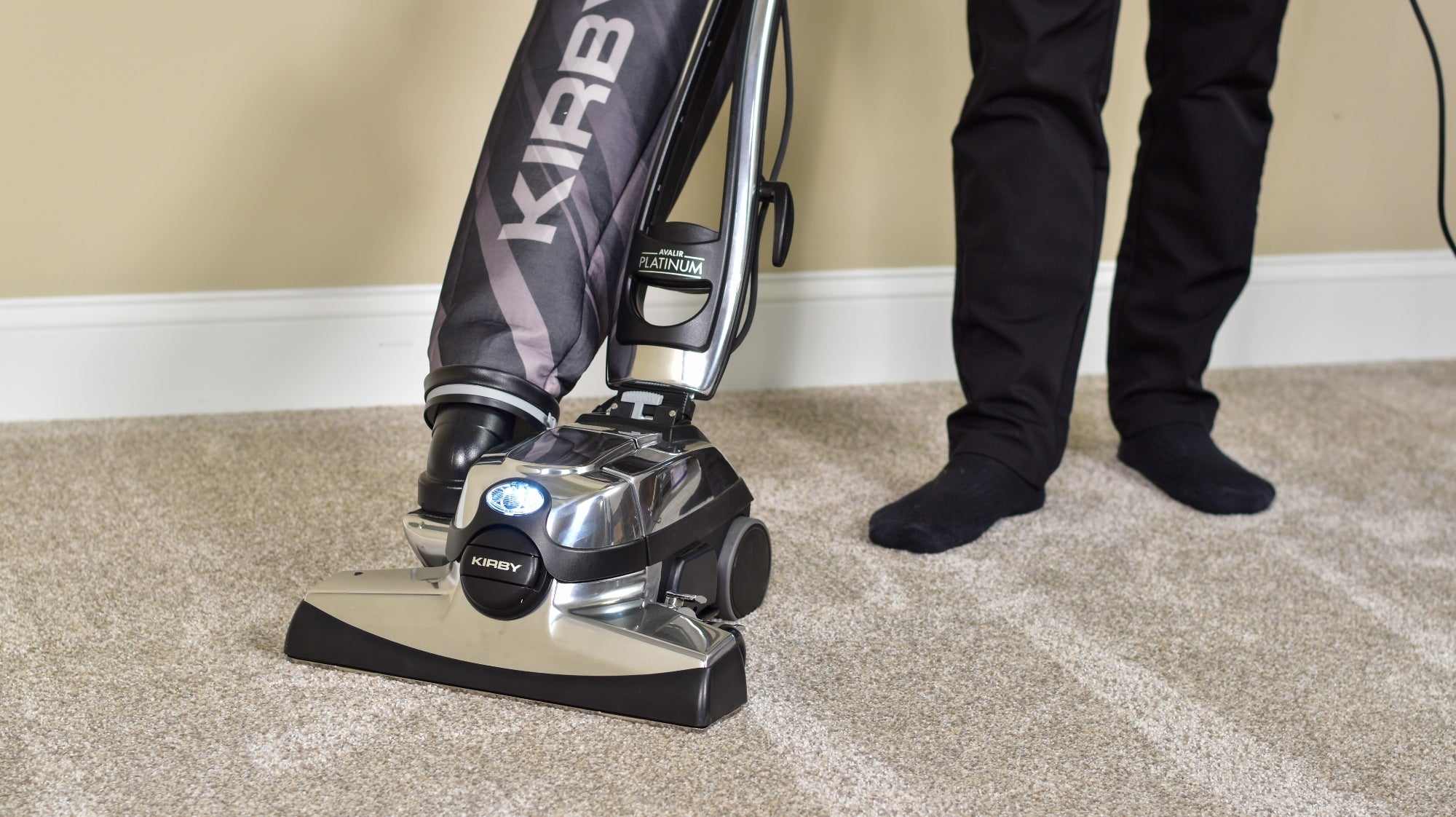 Kirby's Avalir Platinum vacuuming a carpet