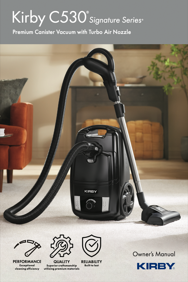 Kirby C530 Signature Series canister vacuum cleaner with a flexible hose and floor nozzle, shown in a living room setting.