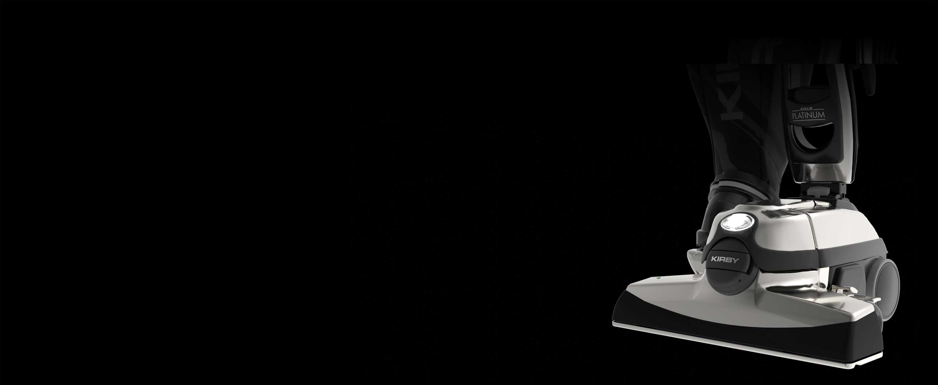 The front of a Kirby vacuum in the dark