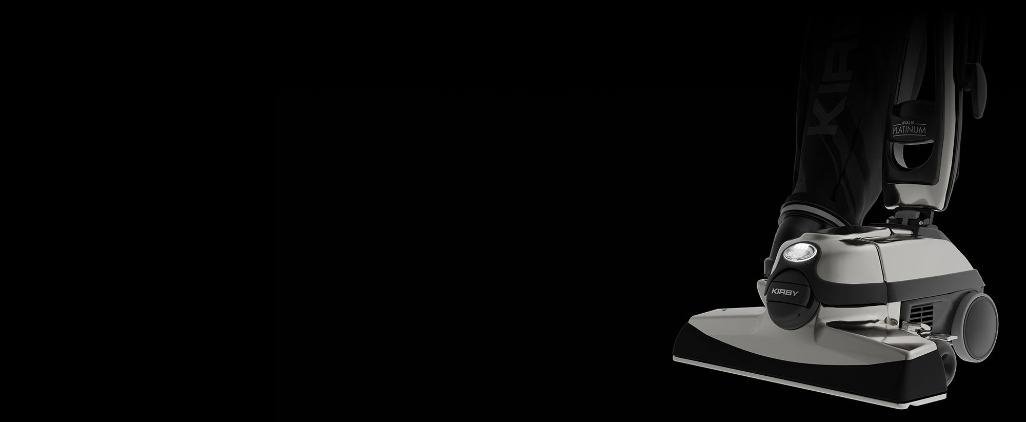 The front of a Kirby vacuum in the dark