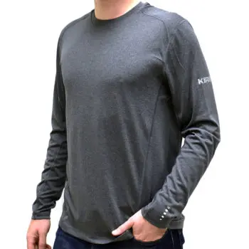 Man wearing a gray long-sleeve athletic shirt with "KIRBY" logo on the sleeve.