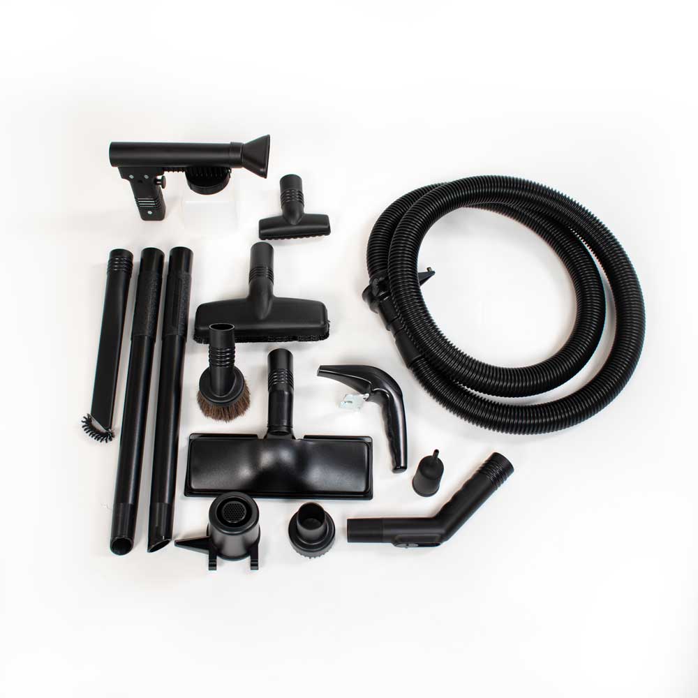 Kirby vacuum attachments in black, including hoses, brushes, and nozzles.