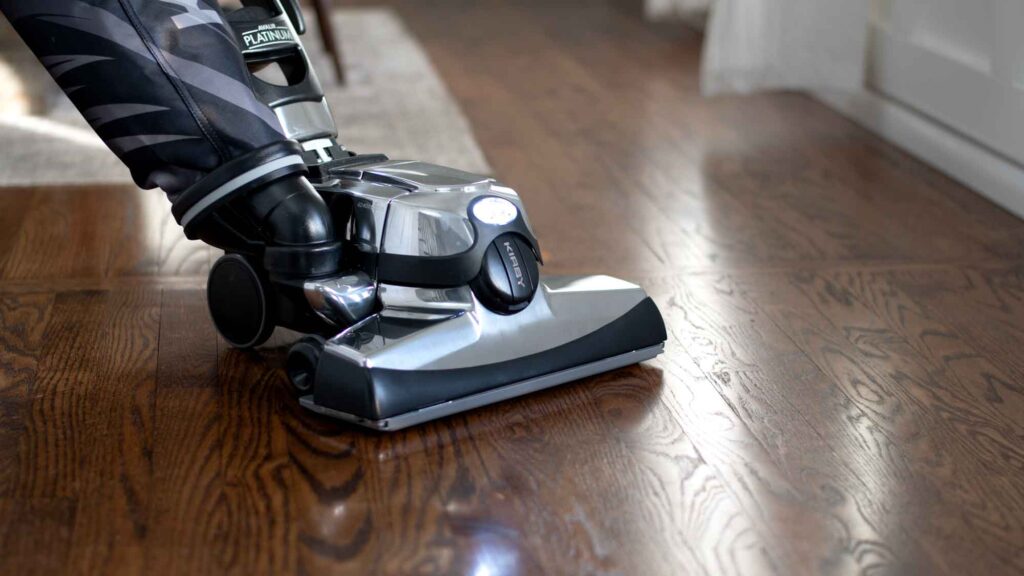 Kirby Avalir Platinum vacuum on hardwood floor.