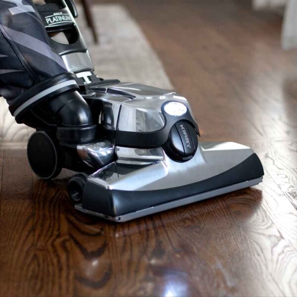 Kirby Avalir Platinum vacuum cleaner on hardwood floor.